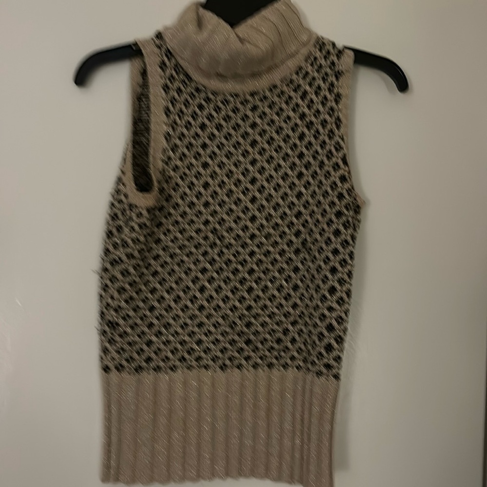 gold and black dressy top.